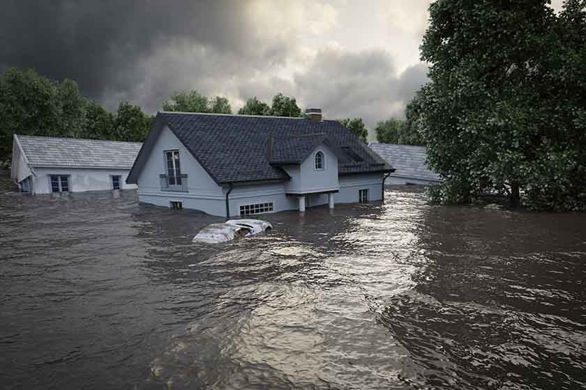 Flood insurance advice from Lenders to Borrowers image of house in flooded
